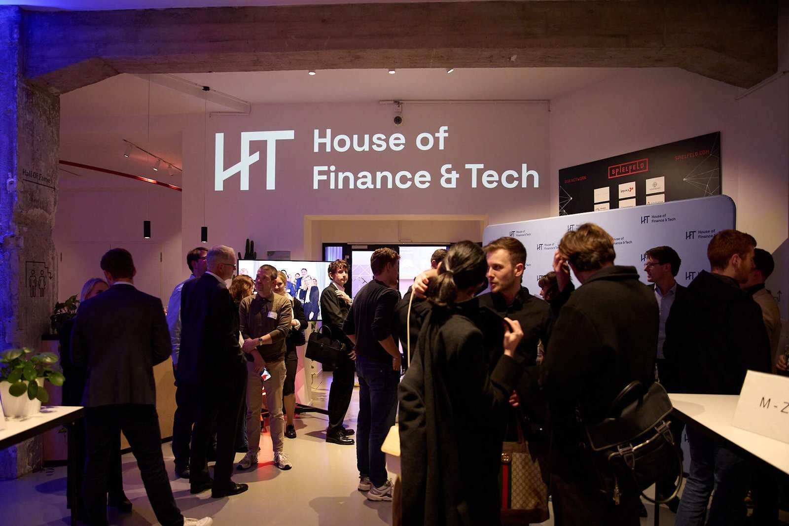 Guests networking at the House of Finance & Tech